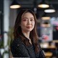 蘑菇tv内容总监林晓雯，职业女性形象，擅长内容生态运营，背景为明亮的创意工作室
